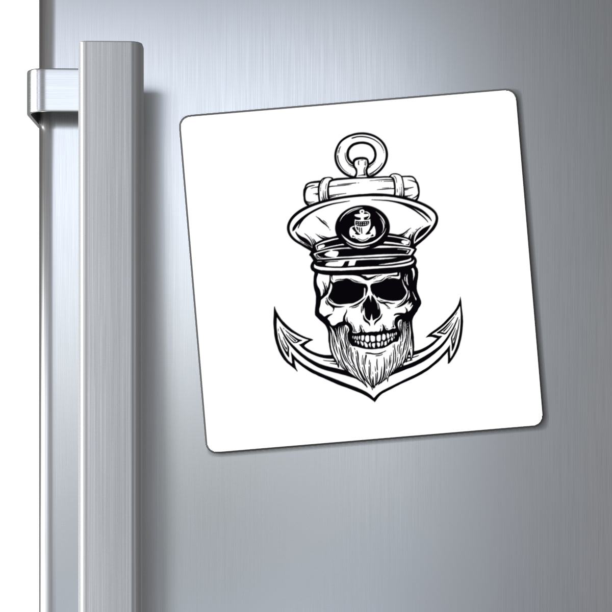 Fridge magnet with a skull wearing a captain's hat and anchor design on a metallic surface.