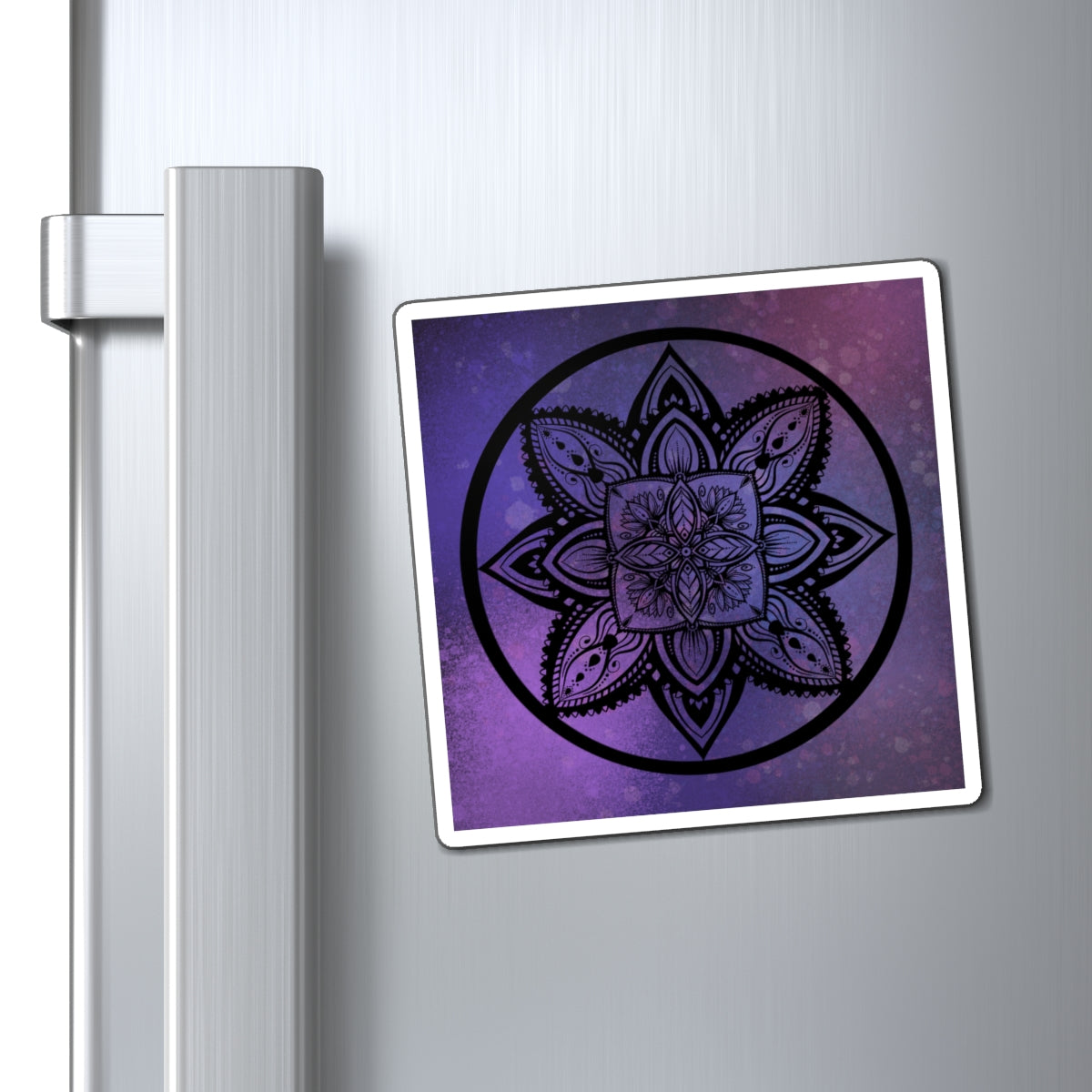 Decorative mandala magnet on a refrigerator door
