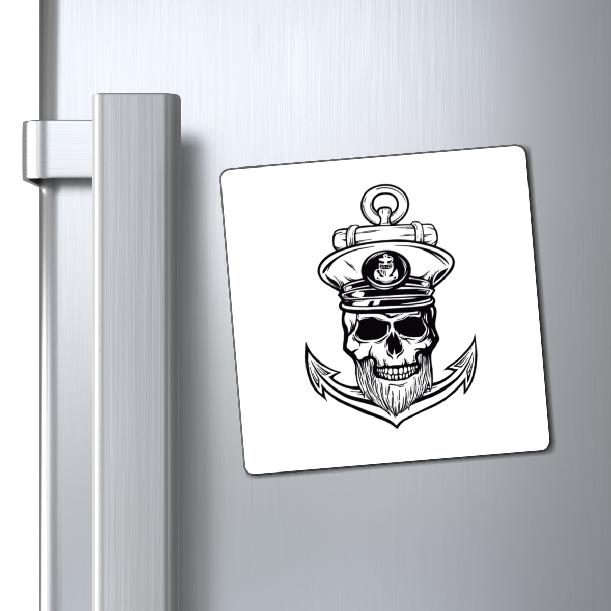 Fridge magnet with a skull wearing a captain's hat design on a refrigerator.