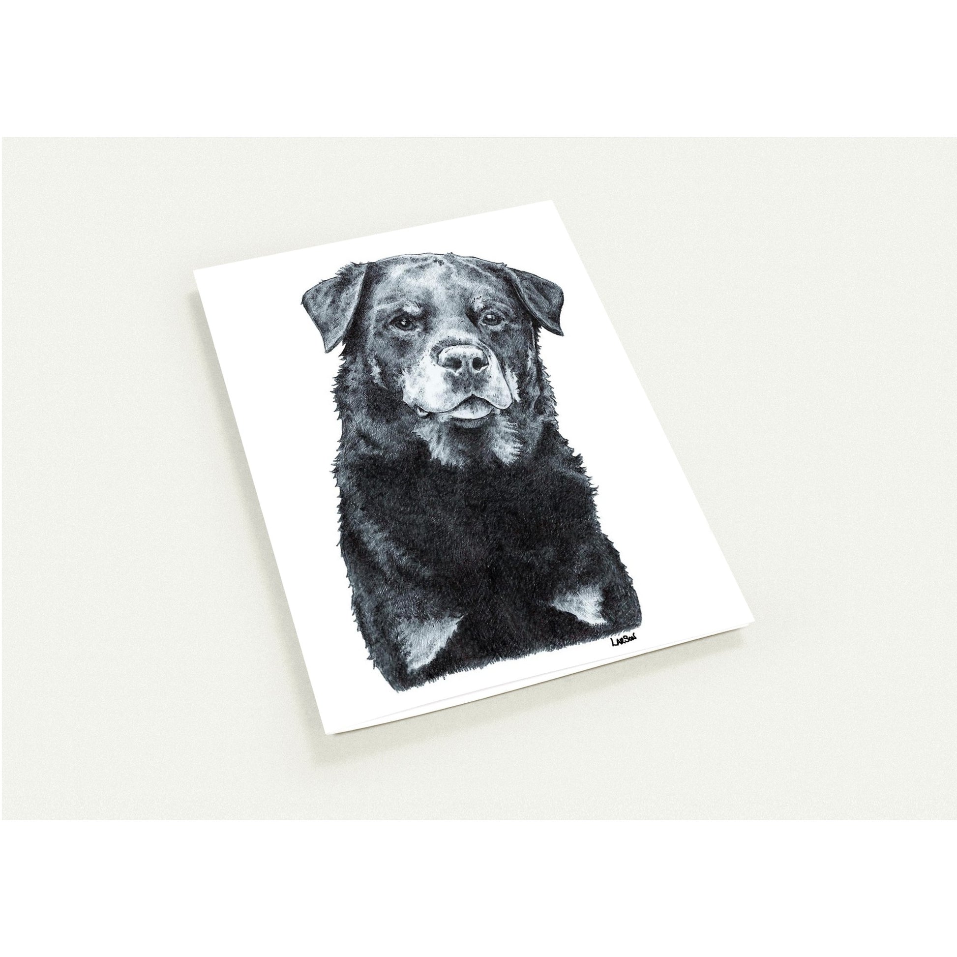 Card with a black and white illustration of a dog on a white background