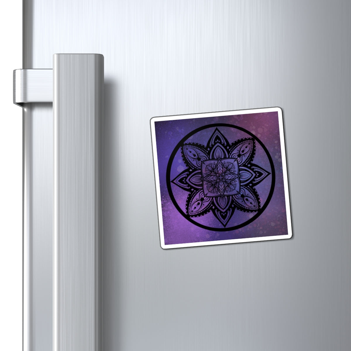 Mandala design magnet on a refrigerator door