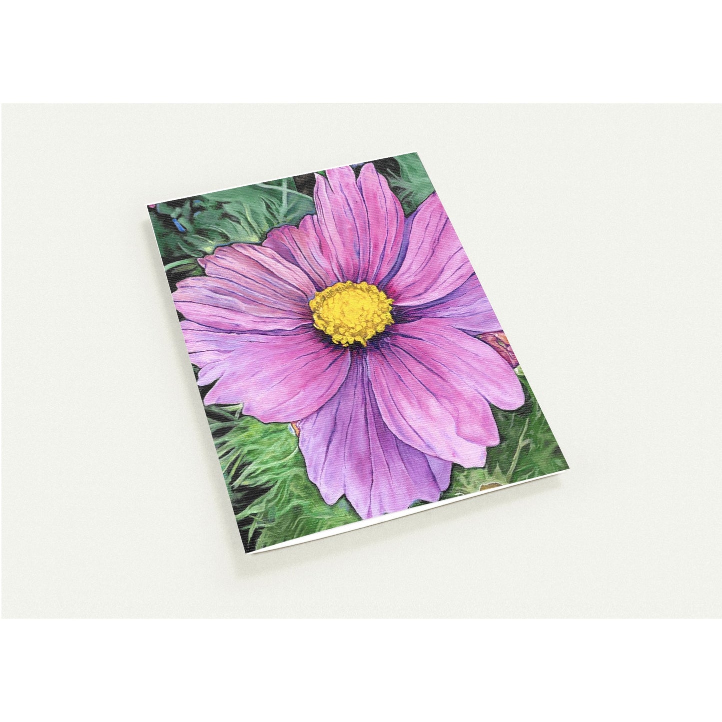 Note card with a pink flower design on a white background