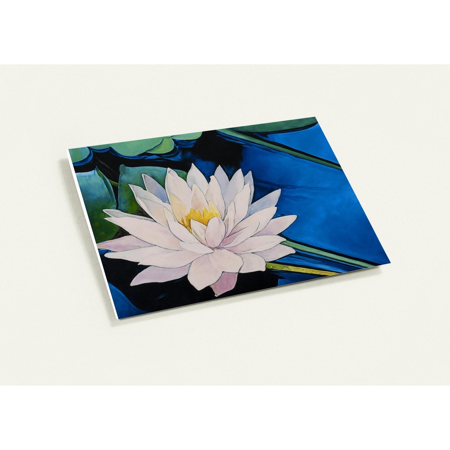 Card with a watercolor illustration of a white water lily on a blue background