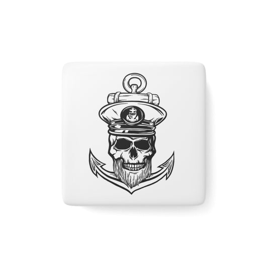 A white magnet featuring a Skull with captain's hat and anchor design on a white background
