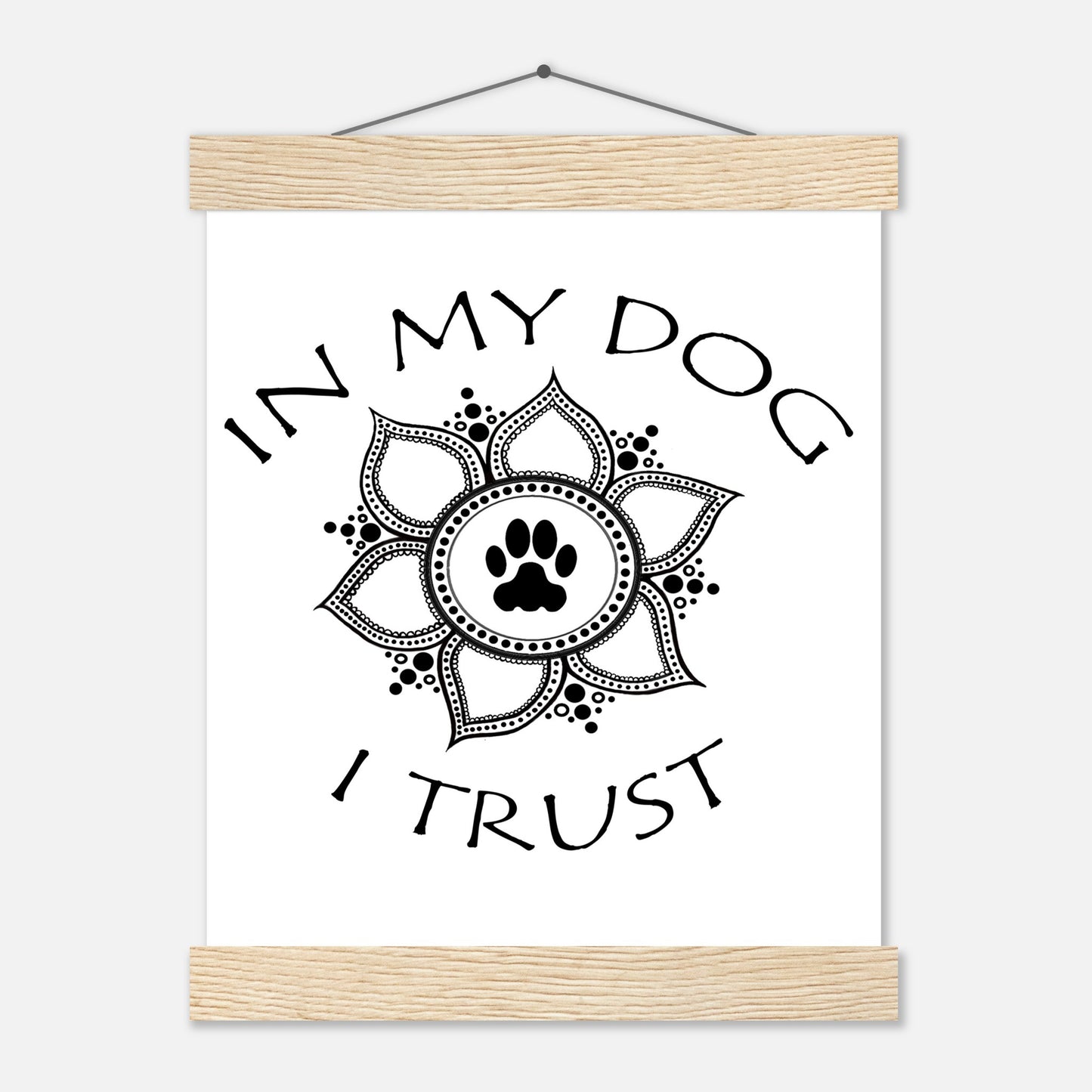 Poster with 'In my dog I trust' text around a  paw print mandala design with a Light colored hanging poster frame with a top and a bottom only on a white background