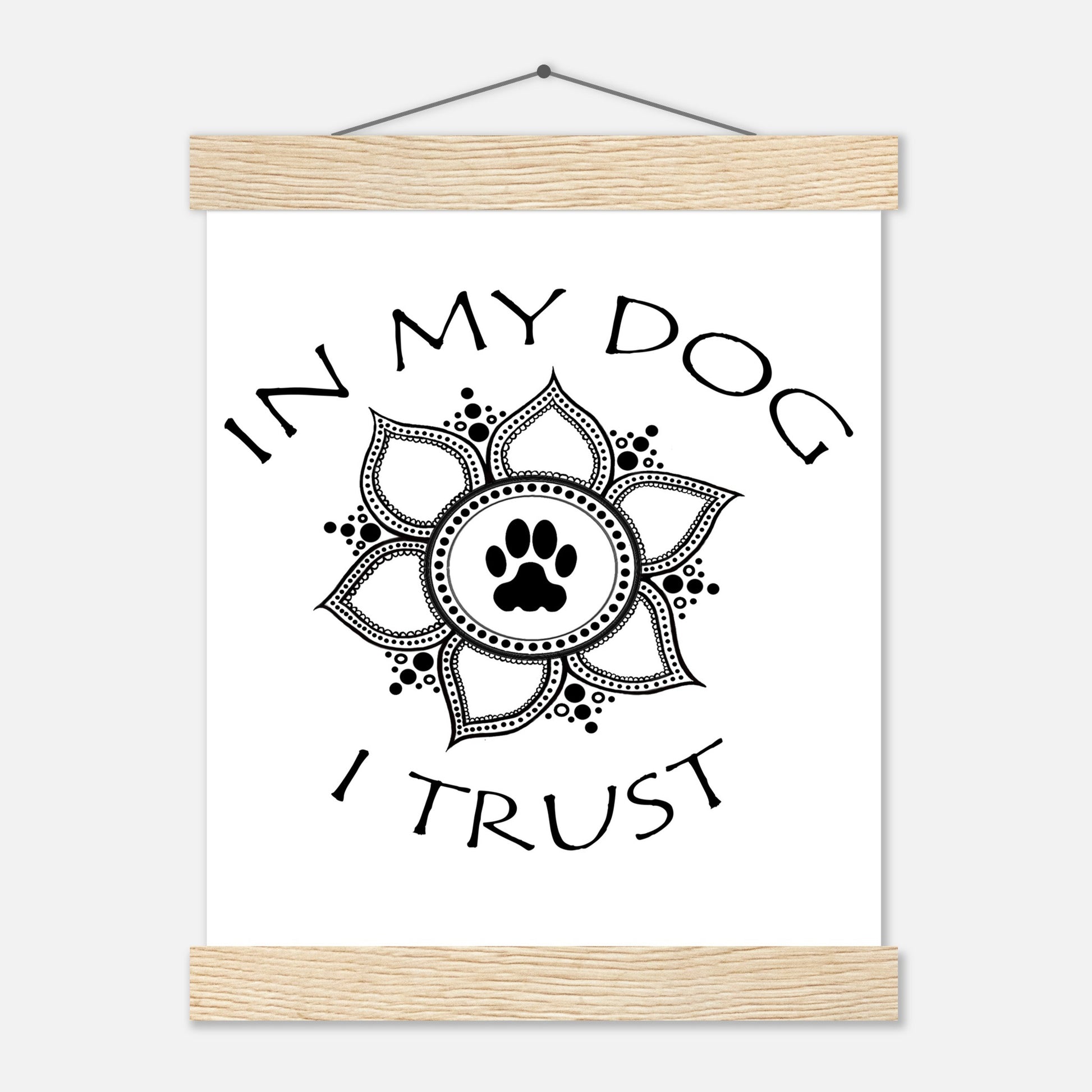 Poster with 'In my dog I trust' text around a  paw print mandala design with a Light colored hanging poster frame with a top and a bottom only on a white background