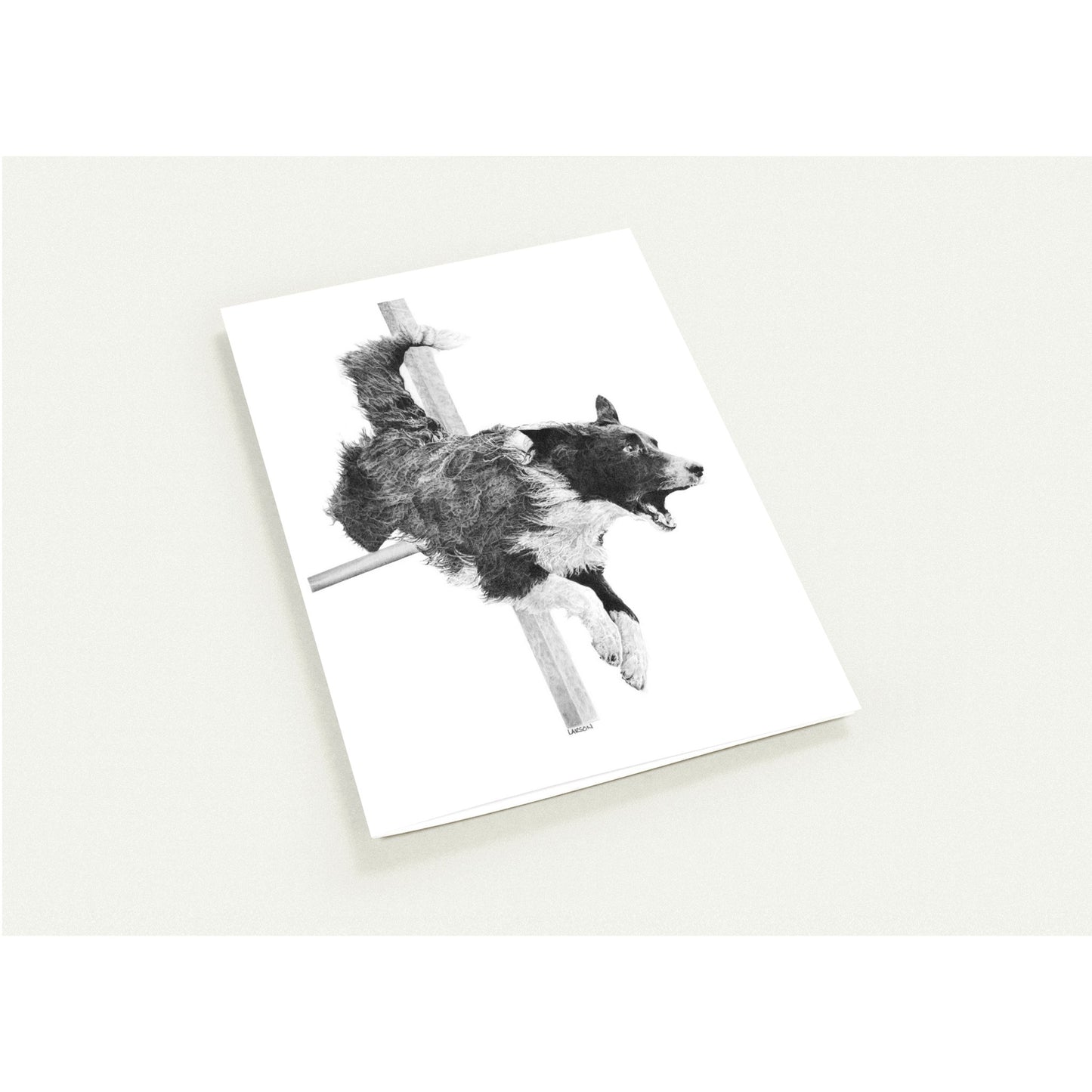 Note card with a black and white illustration of a dog on a white background