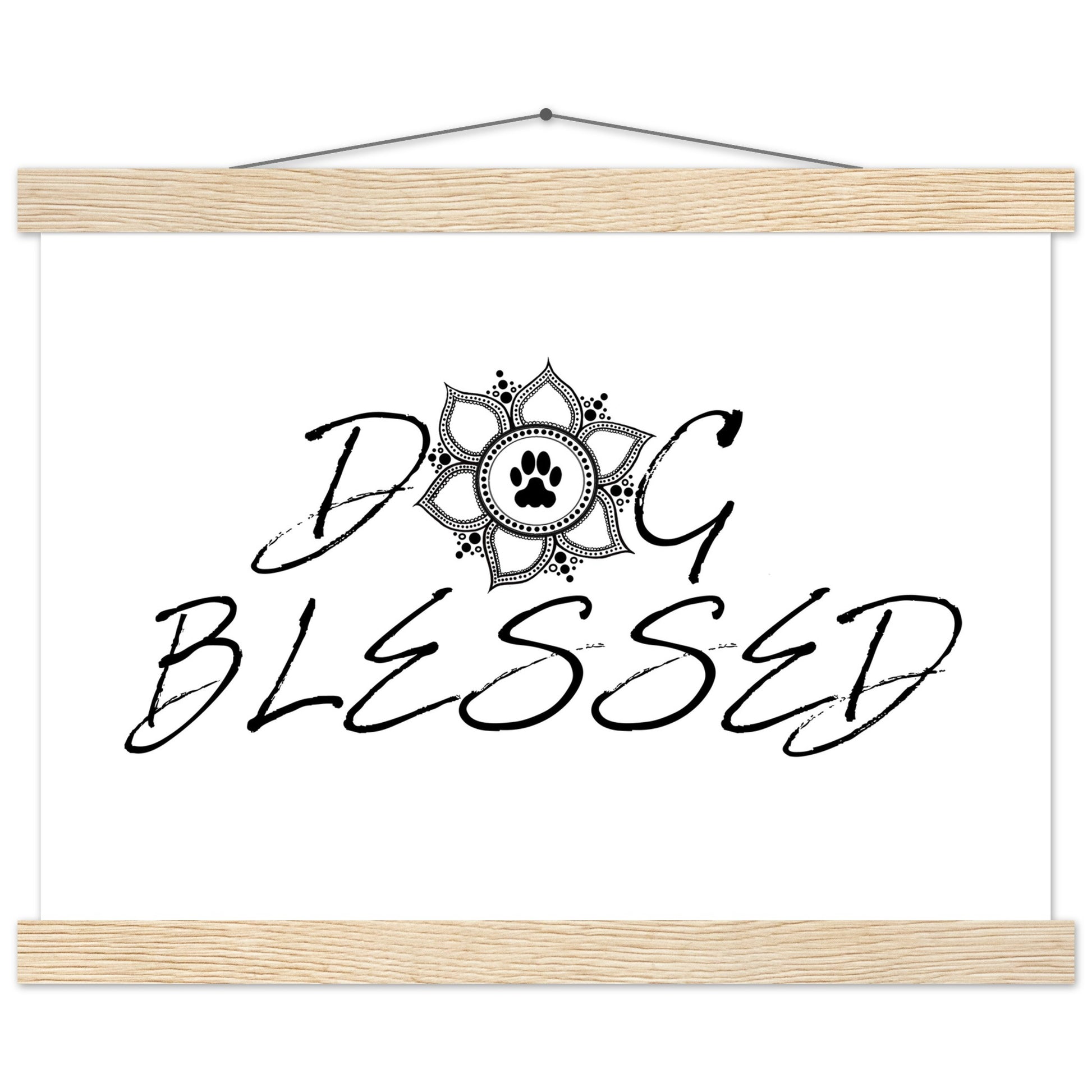 “Black and white ‘Dog Blessed’ typography design with a paw print centered inside a decorative mandala, displayed as a hanging wall sign with a white frame