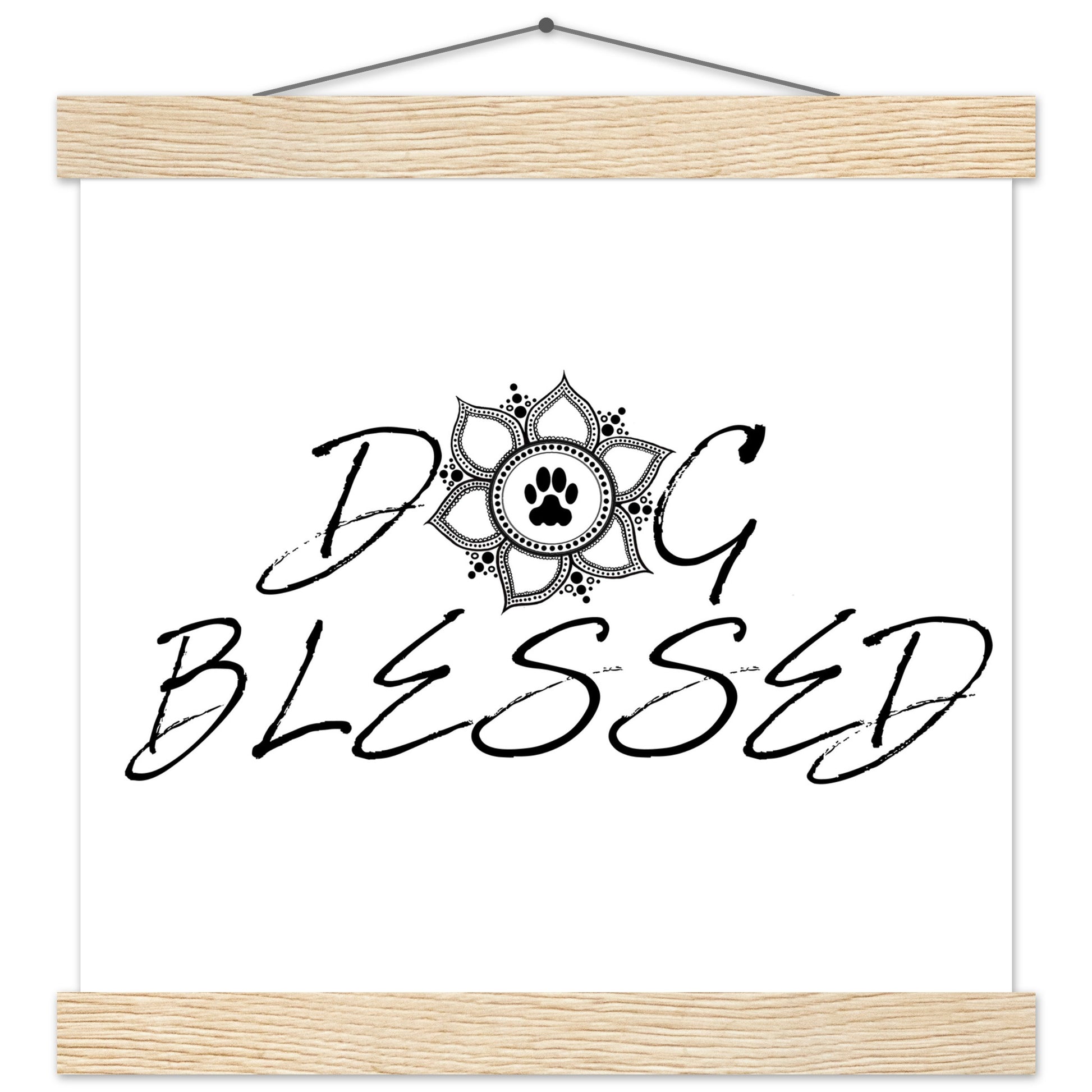 “Black and white ‘Dog Blessed’ typography design with a paw print centered inside a decorative mandala, displayed as a hanging wall sign with a natural wood frame