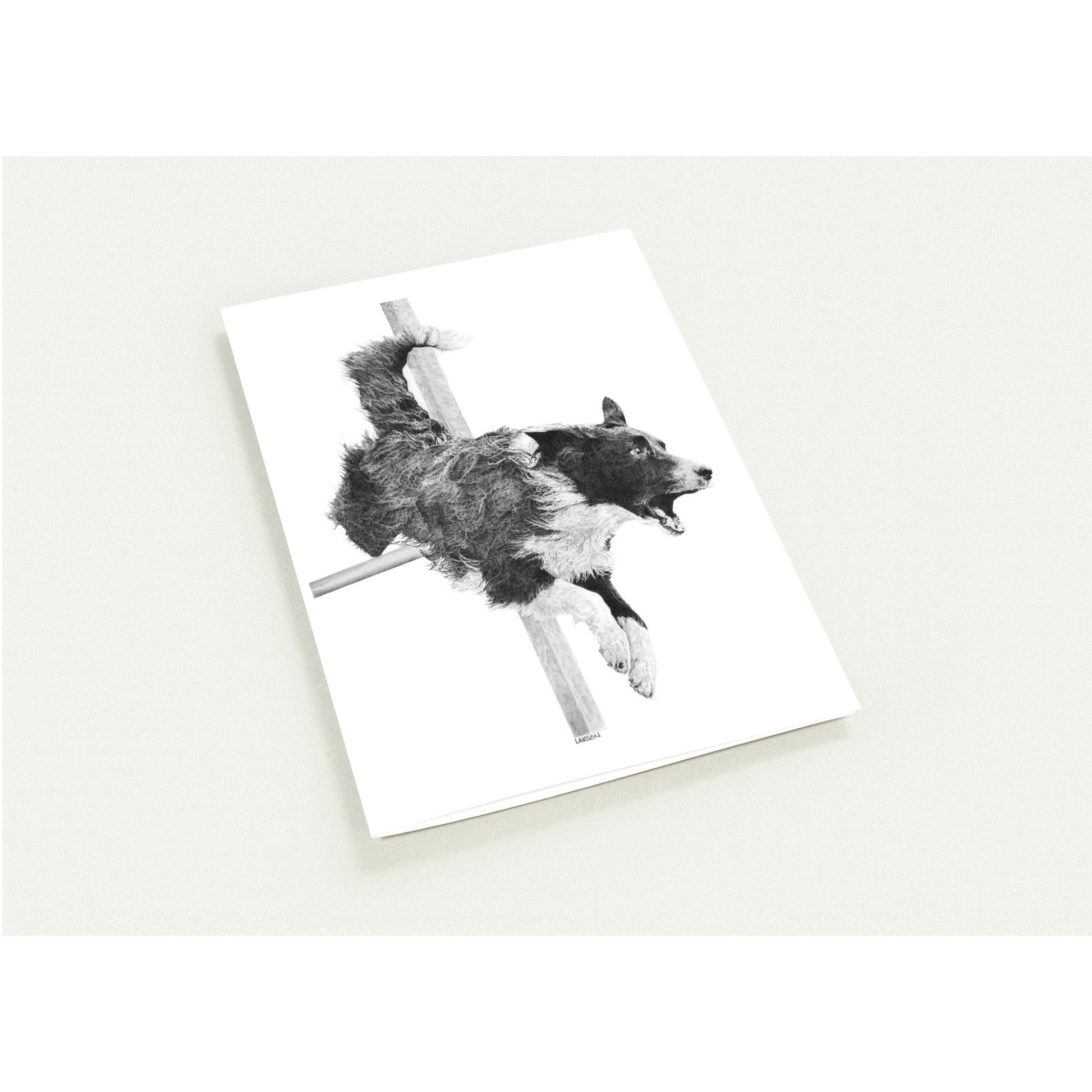Black and white illustration of a dog on a white card